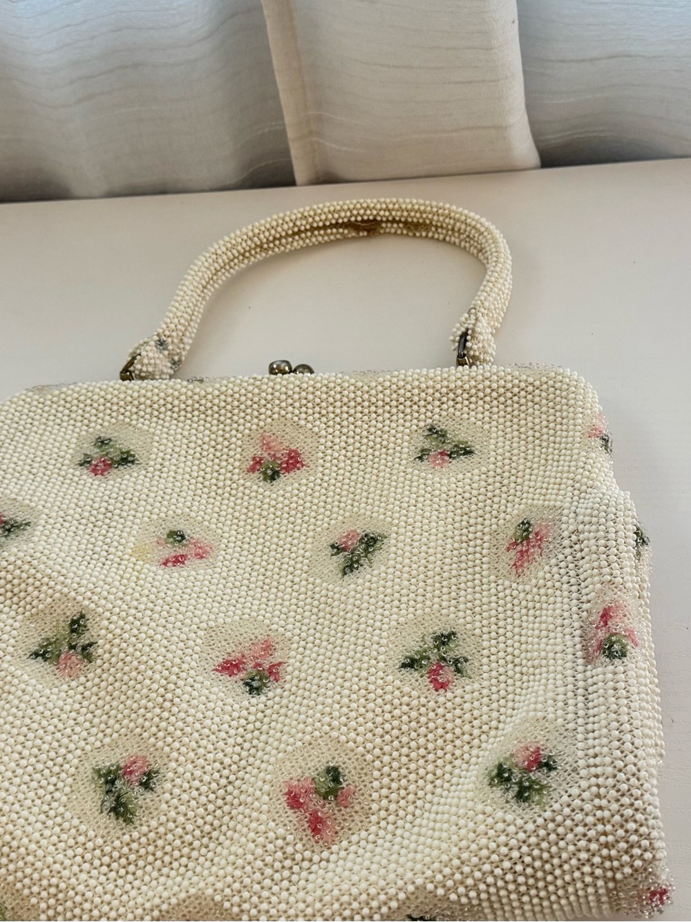 Vintage-Inspired Cream Beaded Handbag with Pink Floral Accents